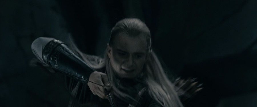<em>Fellowship of the Ring in Moria</em><br><br>Legolas on top of the Troll about to shoot.