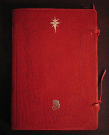 <div class="floatbox" data-fb-options="width:1400 height:80% group:2">Magnoli Props Red Book of Westmarch. Originally written by Bilbo Baggins and expanded by his nephew Frodo, the Red Book then passed into the hands of Samwise Gamgee who finally entrusted it to his eldest daughter Eleanor. It was visited by the other peoples of Middle Earth who contributed to its appendix. Replicated here as the original volume begun by Bilbo and continued by Frodo, this leather bound book is divided into several sections: The Hobbit (or There And Back Again) is written in Bilbo's own hand, who continues with some notes from the Libraries of Rivendell. The Lord of the Rings tells of Frodo's adventures of inheriting and destroying the One Ring of Sauron. Frodo then passes the book.<br /><a href="http://www.indyprops.com/pp-rb.htm" class="transparent">✦</a></div><span class="ngViews">21 views</span>