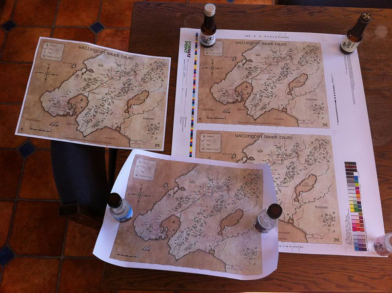 <br />

Daniel Reeve map of Wellington poster: Artist Proof. Images: main AP sheet for the maps (on the right), uncut with all the swatches and crop marks etc still on it. On the left is the finished product, and an unfinished proof (bottom of the photo), without the Dwarven Rhunes on it.