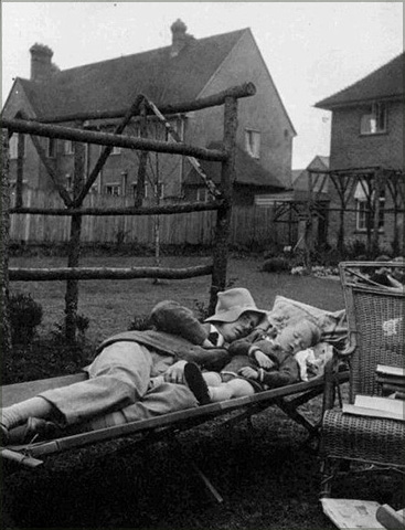 ‘Ordinary family’ man: Tolkien and Christopher napping together in backyard of Oxford home.<span class="ngViews">2 views</span>
